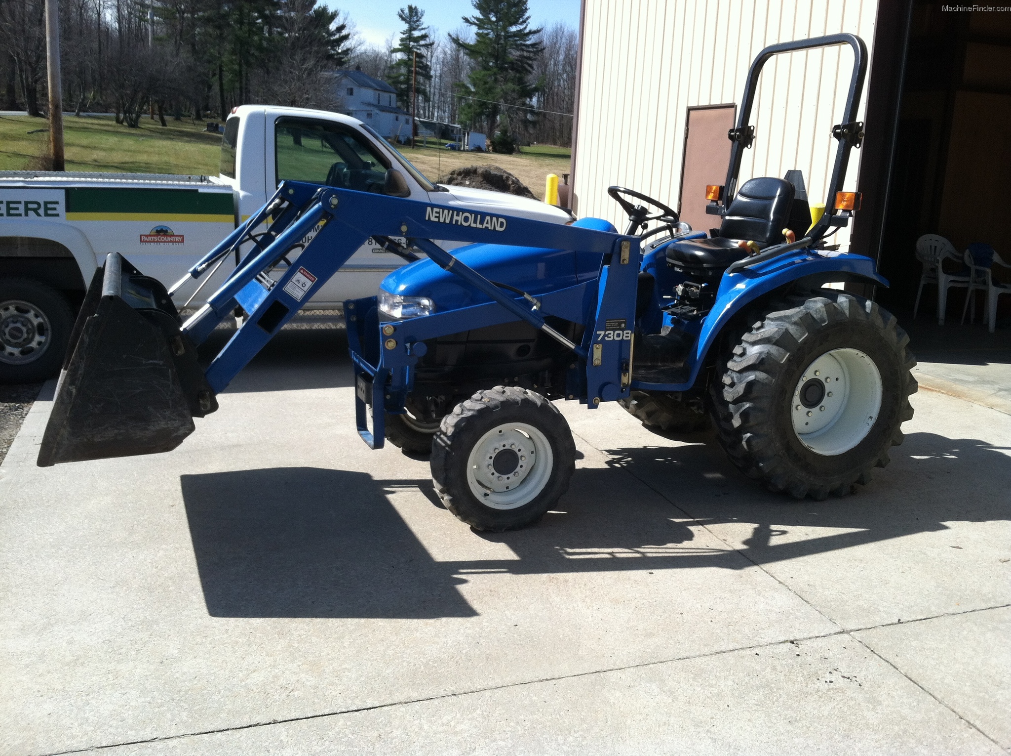 2004 New Holland TC33D Tractors Compact (140hp.) John Deere