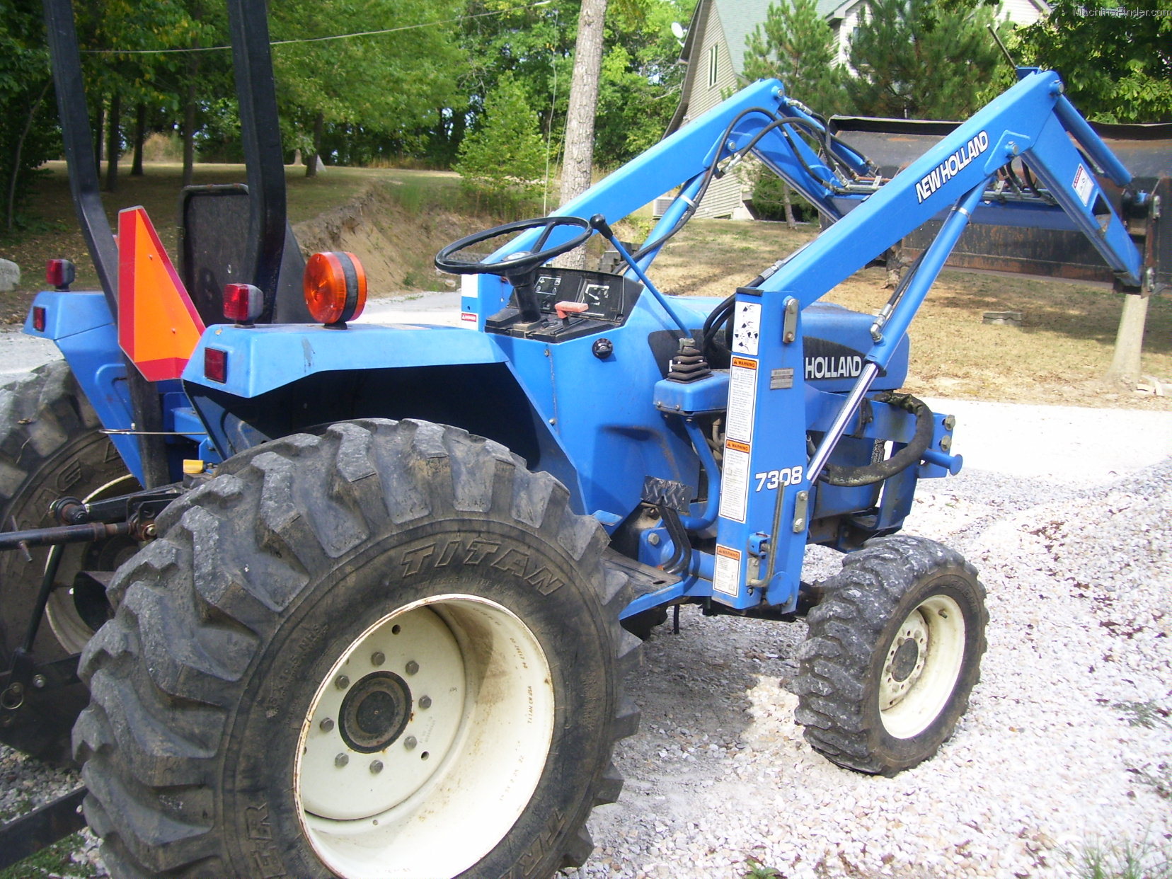 2002 New Holland TC30 Tractors Compact (140hp.) John Deere