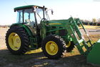 2010 John Deere 6115D