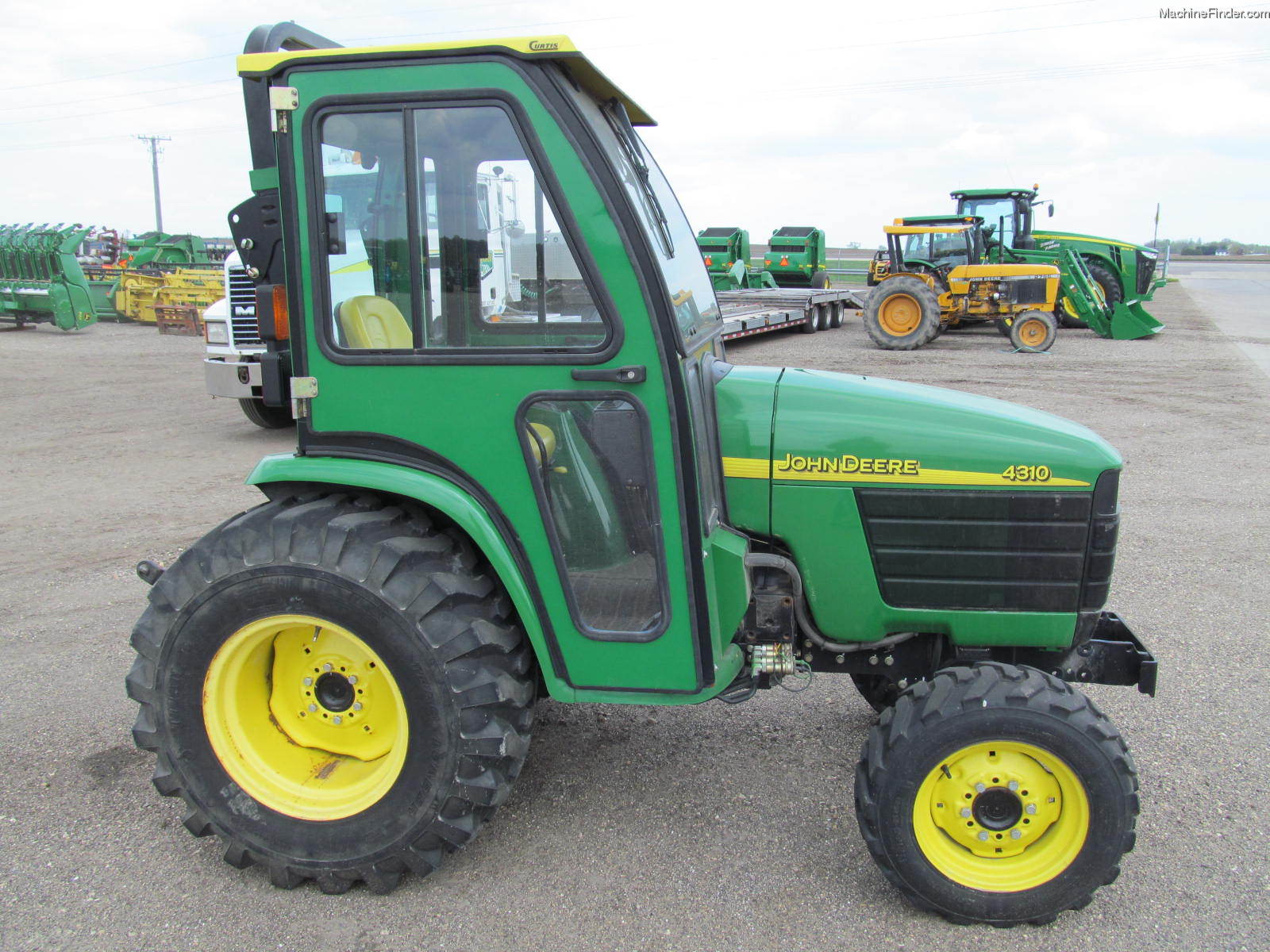 2002 John Deere 4310 Tractors Compact (140hp.) John Deere