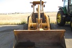 2004 John Deere 210LE