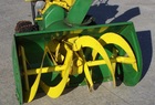 1986 John Deere Model 1032 Snowblower, 10hp electric start, and tire chains