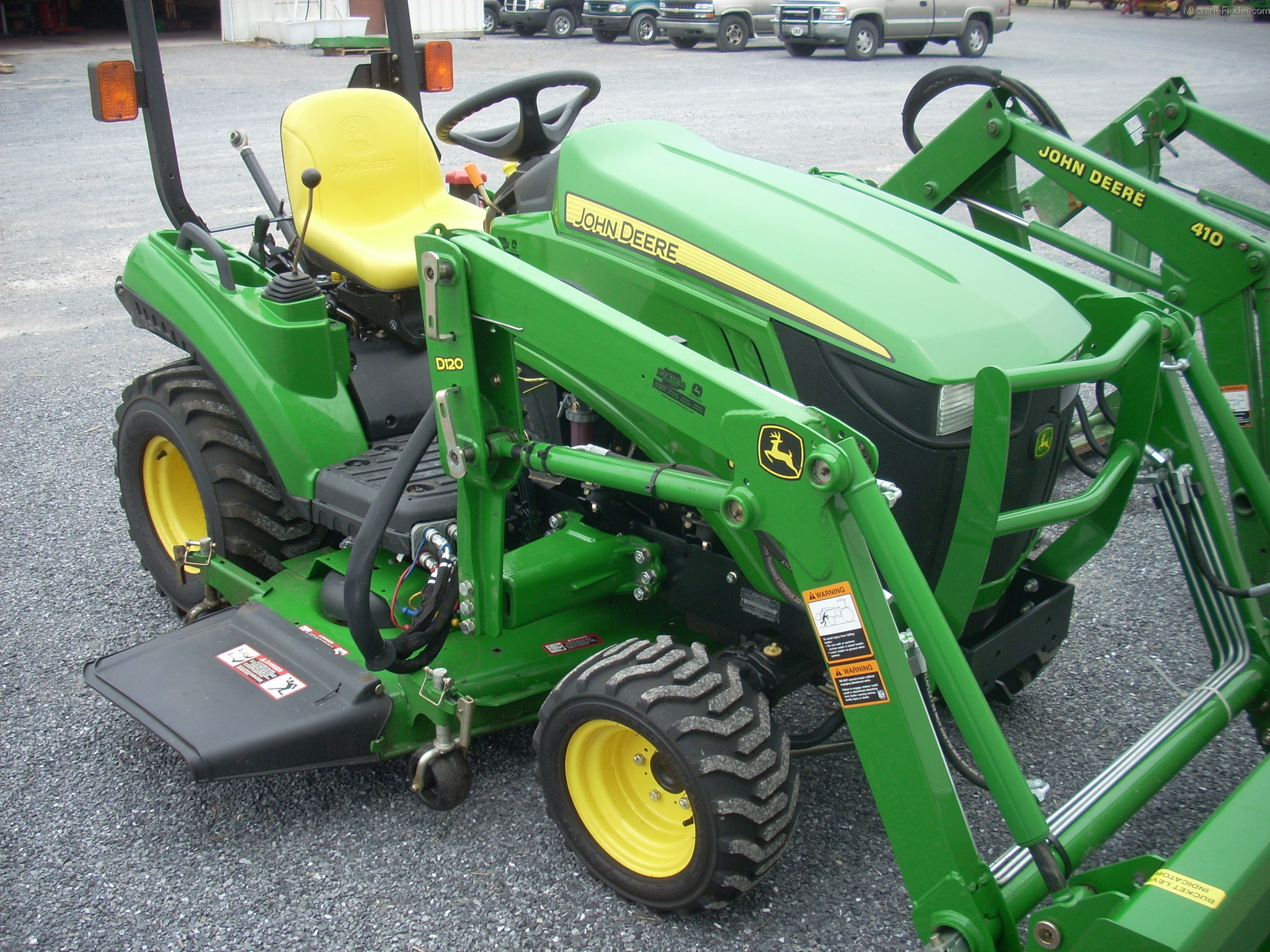 2011 John Deere 1023E Tractors Compact (140hp.) John Deere